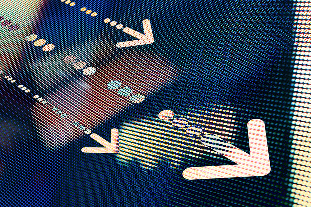 Three Risk Lessons of FTX Grainy looking picture of dots that are blue and yellow with yellowish arrows pointing to the bottom right